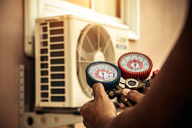 Professional Air Conditioning Service technician working in Whiting, IN
